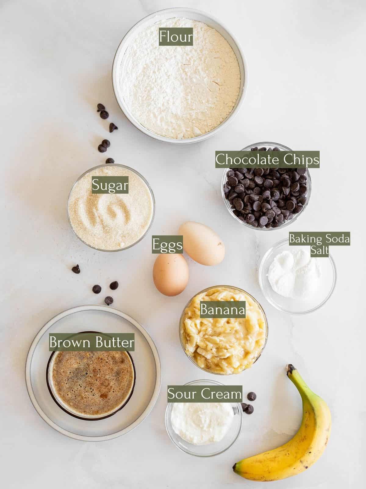 ingredients to make brown butter chocolate chip banana bread labeled with green text boxes.